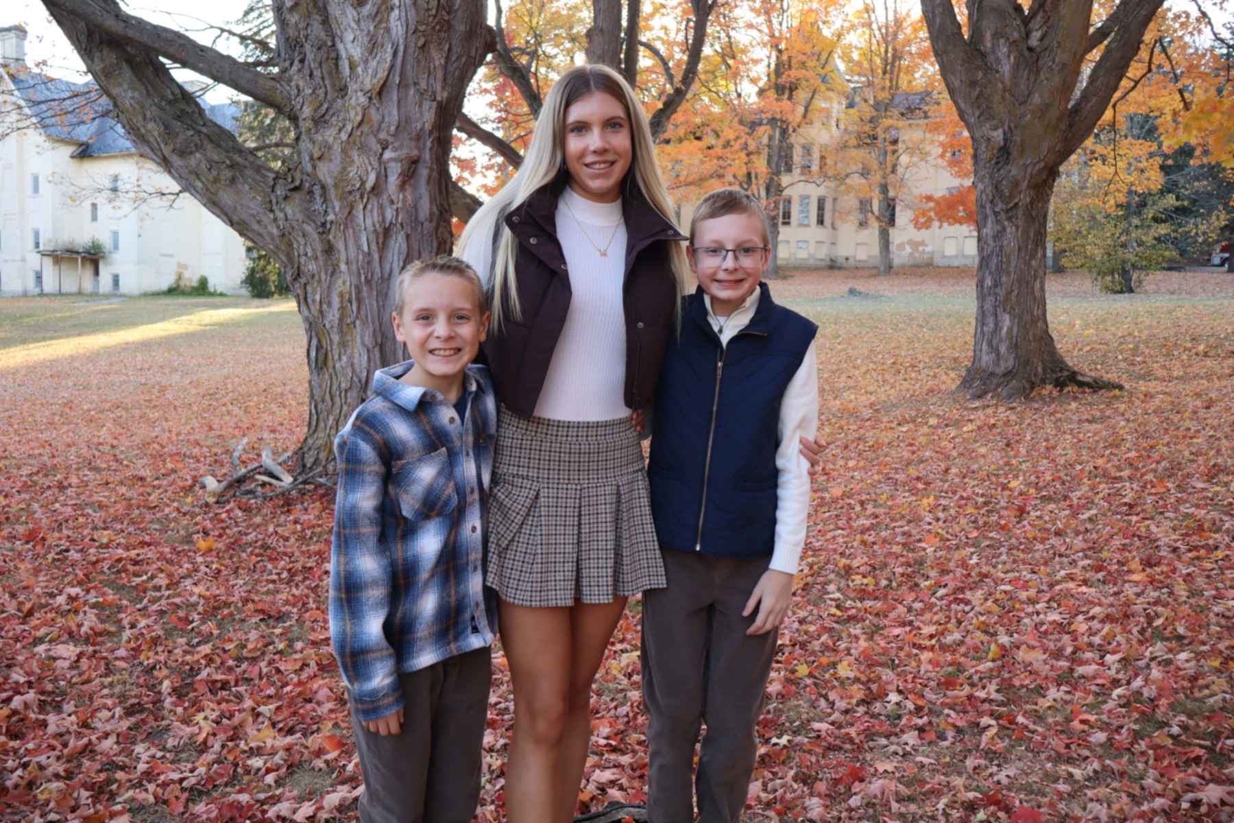 Three-person family portrait by Patrick’s Photography